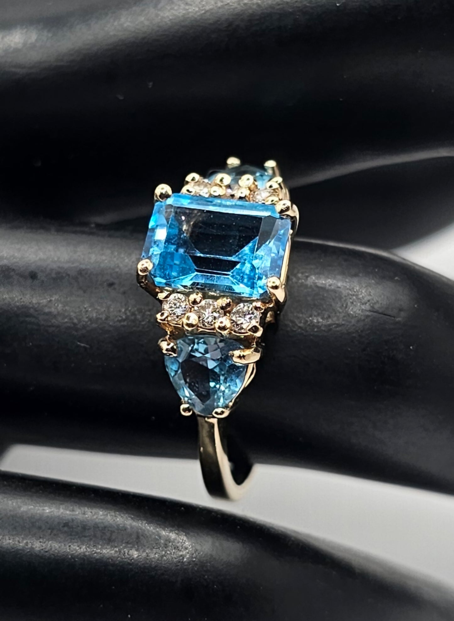 Blue topaz and diamond ring 14k yellow gold