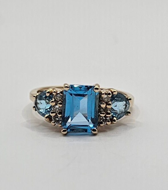 Blue topaz and diamond ring 14k yellow gold