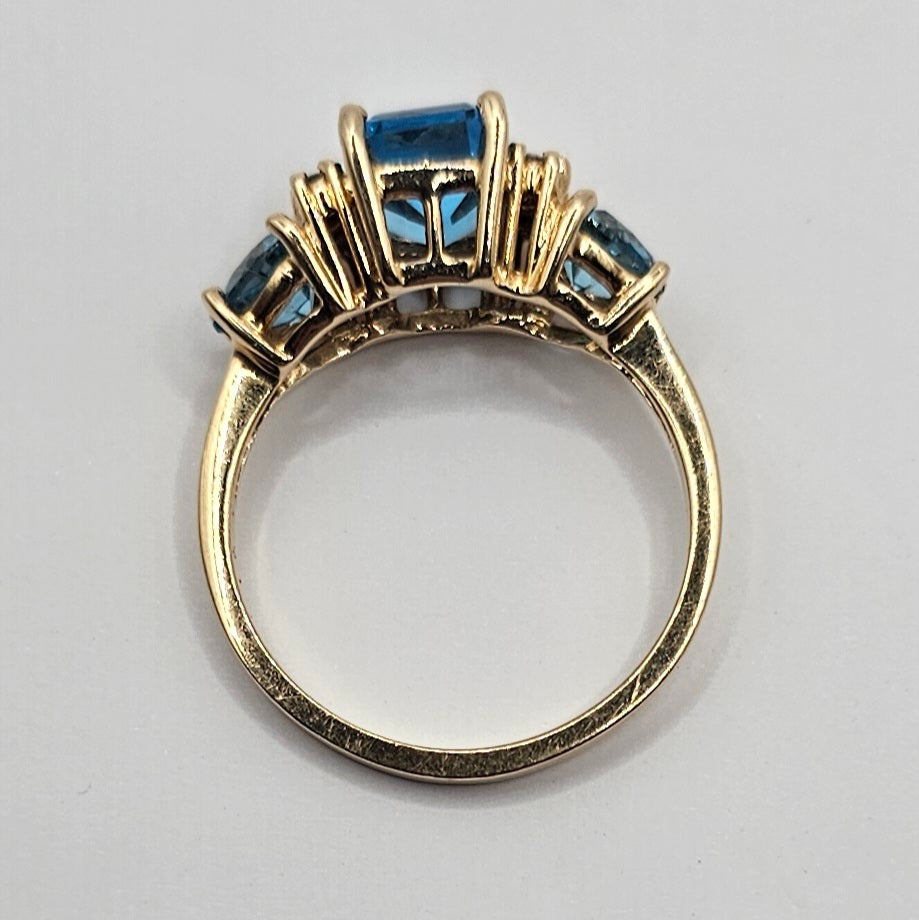Blue topaz and diamond ring 14k yellow gold