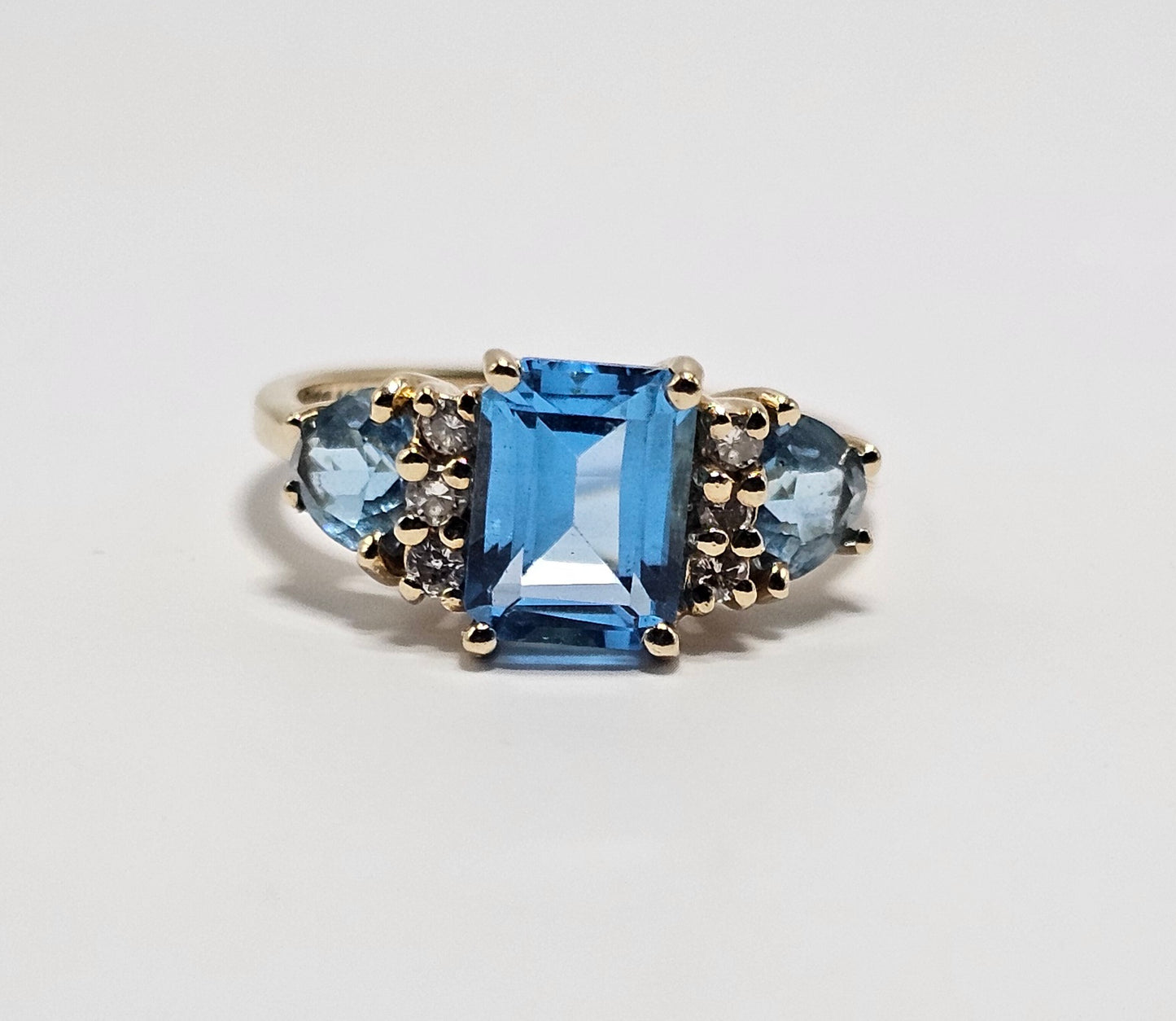 Blue topaz and diamond ring 14k yellow gold