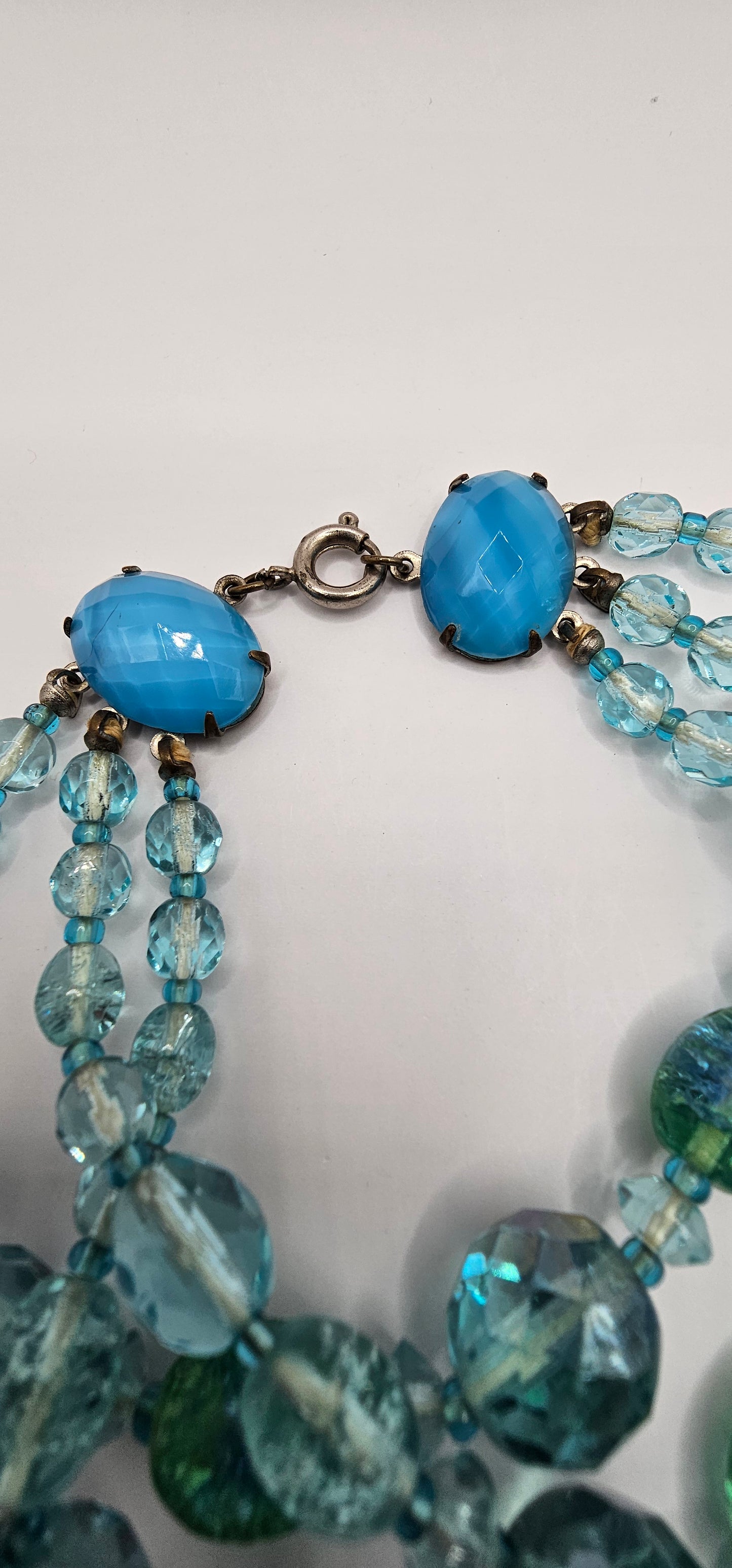 9" Aquamarine colored glass faced bead bracelet
