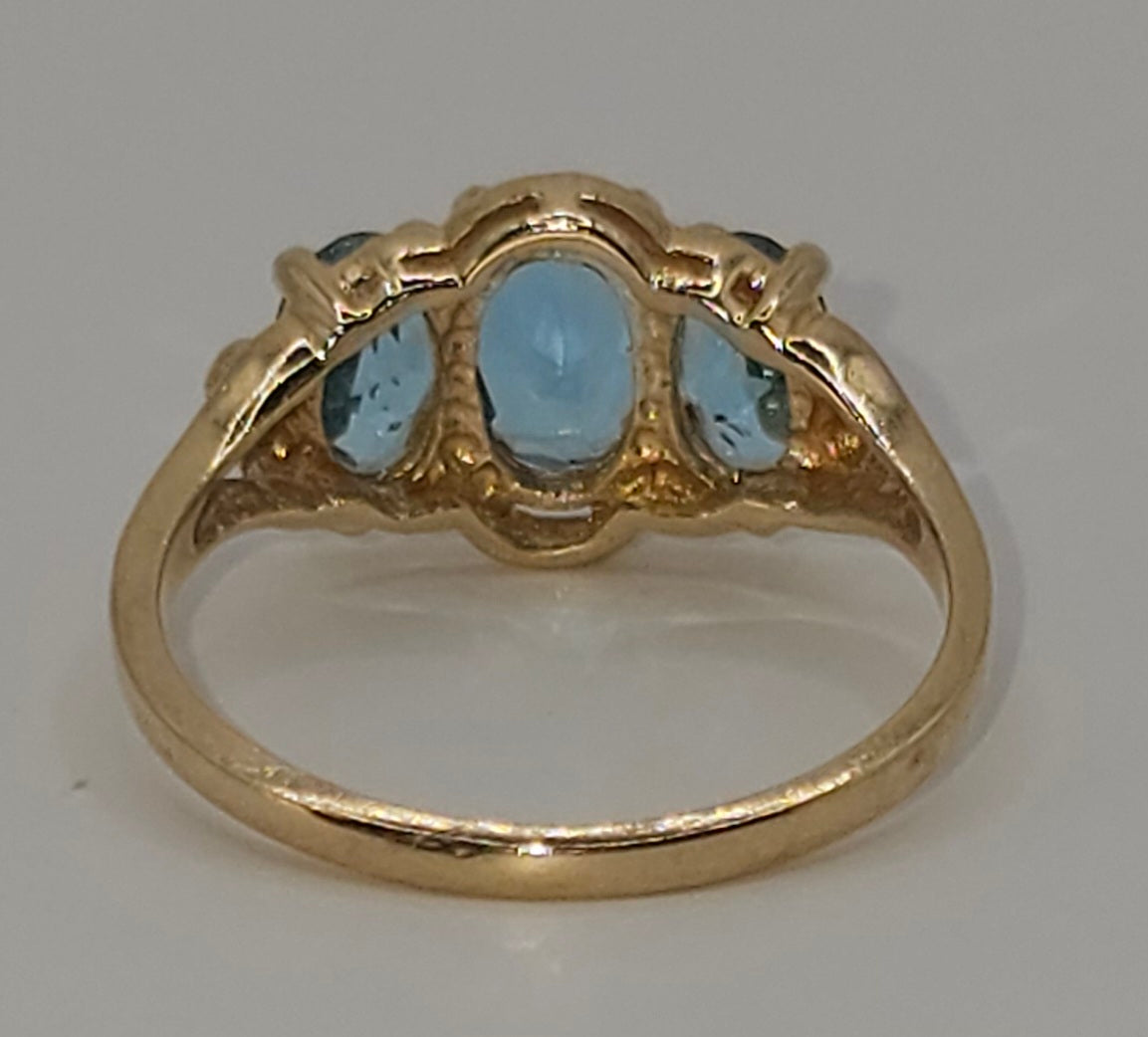 Blue topaz 3 stone 10k gold ring